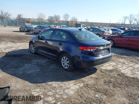 2023 Toyota Corolla Hybrid LE with VIN JTDBCMFE7PJ005985, listed as a IAAI auction lot 41574856 with 31,568 mi miles. Bid and sale history available at carsss.com. Image 3.