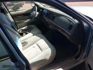 2004 Mercury Grand Marquis GS with VIN 2MEFM74W24X690149, listed as a IAAI auction lot 41842464 with 118,776 mi miles. Bid and sale history available at carsss.com. Image 5.