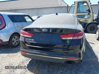 2017 Kia Optima LX z VIN KNAGT4L33H5156094, wystawiony jako IAAI lot #42405505 z przebiegiem 111 622 mil mil oraz . Historia ofert i sprzedaży dostępna na DreamBid. Obrazek 16.