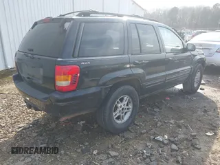 1999 Jeep Grand Cherokee Limited with VIN 1J4GW68S8XC588500, listed as a IAAI auction lot 41484787 with 161,961 mi miles. Bid and sale history available at carsss.com. Image 4.