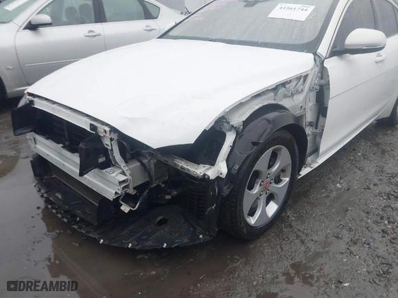 2017 Jaguar XE 25t with VIN SAJAR4BG2HA974050, listed as a IAAI auction lot 41561744 with 131,266 mi miles. Bid and sale history available at carsss.com. Image 6.