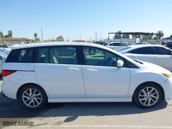 2012 Mazda Mazda5 Touring with VIN JM1CW2CL7C0140452, listed as a IAAI auction lot 41970209 with 92,069 mi miles. Bid and sale history available at carsss.com. Image 14.