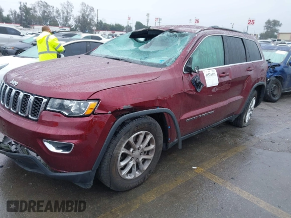 2021 Jeep Grand Cherokee Laredo X with VIN 1C4RJEAG4MC681989, listed as a IAAI auction lot 41571341 with 61,090 mi miles and . Bid and sale history available at DreamBid. Image 17.