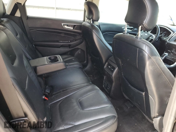 2015 Ford Edge Titanium z VIN 2FMTK3K87FBB38309, wystawiony jako Copart lot #79662514 z przebiegiem 185 342 mil mil oraz Szkoda całkowita • Salvage title. Historia ofert i sprzedaży dostępna na DreamBid. Obrazek 11.