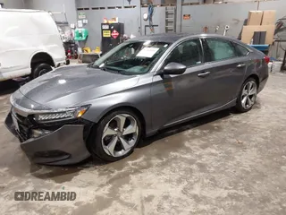 2019 Honda Accord Touring with VIN 1HGCV2F99KA031634, listed as a IAAI auction lot 41209019 with 74,965 mi miles and . Bid and sale history available at DreamBid. Image 2.