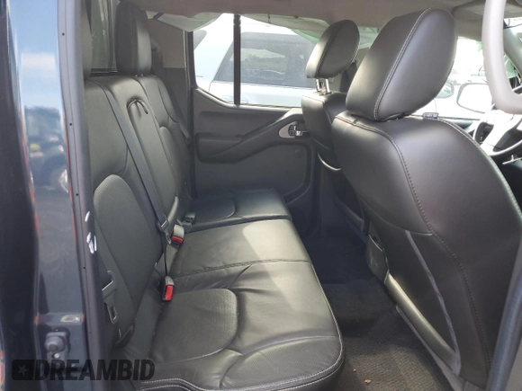 2018 Nissan Frontier Pro-4X with VIN 1N6DD0EV5JN702214, listed as a Copart auction lot 52802715 with 79,837 mi miles and Salvage title. Bid and sale history available at DreamBid. Image 10.