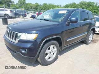 2011 Jeep Grand Cherokee Laredo with VIN 1J4RR4GG2BC550934, listed as a IAAI auction lot 42467947 with 198,904 mi miles and . Bid and sale history available at DreamBid. Image 2.