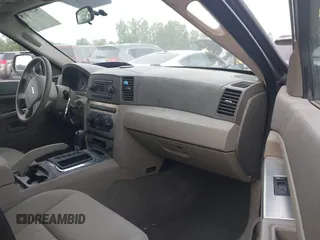 2005 Jeep Grand Cherokee Laredo z VIN 1J4GR48K75C719070, wystawiony jako IAAI lot #42673745 z przebiegiem 181 152 mil mil oraz . Historia ofert i sprzedaży dostępna na DreamBid. Obrazek 5.