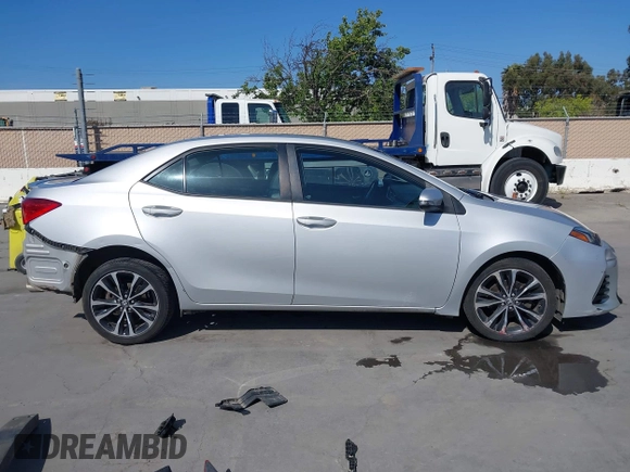 2017 Toyota Corolla L z VIN 5YFBURHE6HP652091, wystawiony jako IAAI lot #42131898 z przebiegiem 380 284 mil mil oraz . Historia ofert i sprzedaży dostępna na DreamBid. Obrazek 13.