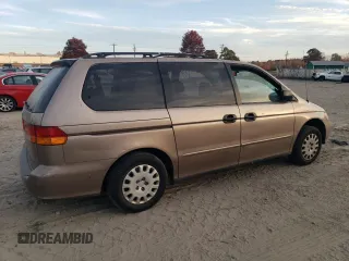 2003 Honda Odyssey LX z VIN 5FNRL18533B084504, wystawiony jako Copart lot #52674495 z przebiegiem 189 256 mil mil oraz Nie do naprawy • Non repairable. Historia ofert i sprzedaży dostępna na DreamBid. Obrazek 3.