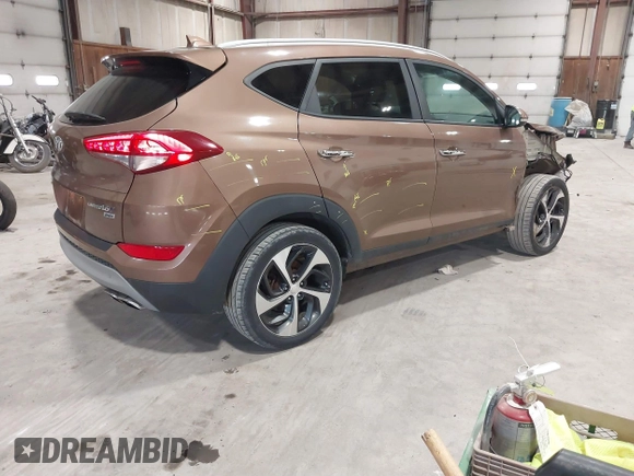 2017 Hyundai Tucson Sport with VIN KM8J3CA29HU418926, listed as a IAAI auction lot 41842649 with 73,605 mi miles and . Bid and sale history available at DreamBid. Image 4.