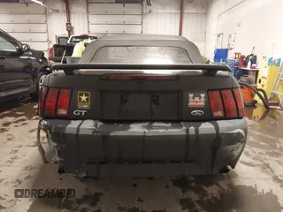 2002 Ford Mustang GT Deluxe z VIN 1FAFP45X92F176117, wystawiony jako IAAI lot #41619448 z przebiegiem 178 787 mil mil oraz . Historia ofert i sprzedaży dostępna na DreamBid. Obrazek 16.