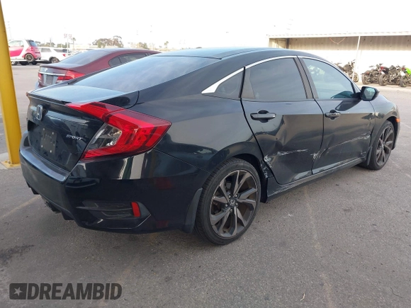 2021 Honda Civic Sport with VIN 2HGFC2F81MH515005, listed as a IAAI auction lot 41725843 with 43,583 mi miles and . Bid and sale history available at DreamBid. Image 4.