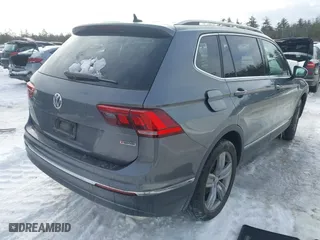 2020 Volkswagen Tiguan SE with VIN 3VV2B7AXXLM093989, listed as a IAAI auction lot 41599430 with 28,801 mi miles. Bid and sale history available at carsss.com. Image 4.