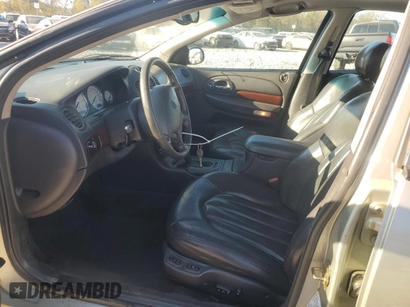 2000 Chrysler 300M M z VIN 2C3HE66G0YH165103, wystawiony jako Copart lot #80577094 z przebiegiem Nie podano mil oraz Szkoda całkowita • Salvage title. Historia ofert i sprzedaży dostępna na DreamBid. Obrazek 7.