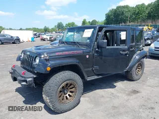 2017 Jeep Wrangler Unlimited Rubicon Recon with VIN 1C4BJWFG7HL525709, listed as a IAAI auction lot 42569577 with 119,560 mi miles and . Bid and sale history available at DreamBid. Image 17.