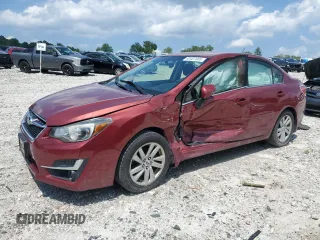 2016 Subaru Impreza Premium with VIN JF1GJAB66GH003070, listed as a Copart auction lot 63407805 with Not provided miles and Salvage title. Bid and sale history available at DreamBid. Image 1.