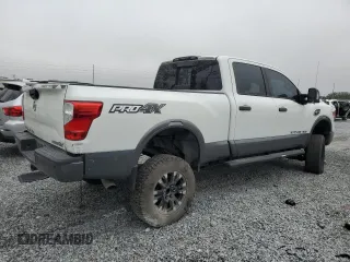 2017 Nissan Titan XD SL with VIN 1N6BA1F43HN544218, listed as a Copart auction lot 85758614 with 124,765 mi miles and Salvage Title. Bid and sale history available at carsss.com. Image 3.