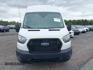 2022 Ford Transit Cargo with VIN 1FTBR3X85NKA74408, listed as a IAAI auction lot 42150248 with 88,887 mi miles and . Bid and sale history available at DreamBid. Image 12.