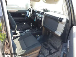 2007 Toyota FJ Cruiser with VIN JTEBU11F370035644, listed as a IAAI auction lot 41698247 with 214,482 mi miles. Bid and sale history available at carsss.com. Image 5.