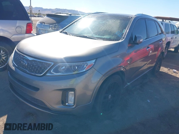 2014 Kia Sorento SX with VIN 5XYKW4A75EG457768, listed as a IAAI auction lot 41388412 with 129,691 mi miles. Bid and sale history available at carsss.com. Image 2.