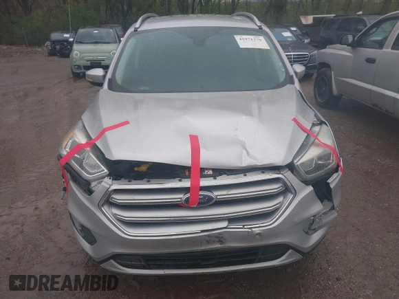 2017 Ford Escape Titanium with VIN 1FMCU0J96HUC21987, listed as a IAAI auction lot 41971376 with 97,488 mi miles and . Bid and sale history available at DreamBid. Image 12.