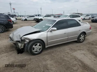 1999 Honda Accord EX with VIN 1HGCG5655XA046602, listed as a Copart auction lot 60259025 with 141,394 mi miles and Salvage title. Bid and sale history available at DreamBid. Image 1.