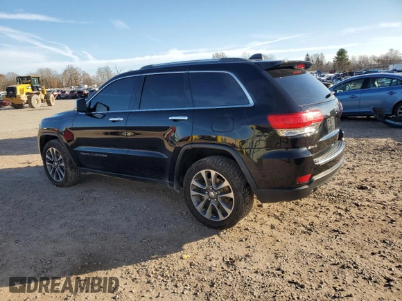 2018 Jeep Grand Cherokee Limited with VIN 1C4RJFBT9JC200504, listed as a Copart auction lot 80481684 with 104,398 mi miles and Salvage title. Bid and sale history available at DreamBid. Image 2.