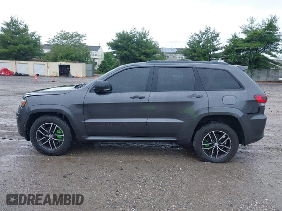 2017 Jeep Grand Cherokee Trailhawk with VIN 1C4RJFLG2HC645209, listed as a IAAI auction lot 42348470 with 170,905 mi miles and . Bid and sale history available at DreamBid. Image 14.
