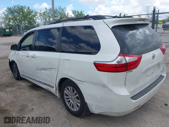 2016 Toyota Sienna XLE with VIN 5TDYK3DC4GS702638, listed as a IAAI auction lot 42255793 with 124,977 mi miles and . Bid and sale history available at DreamBid. Image 3.