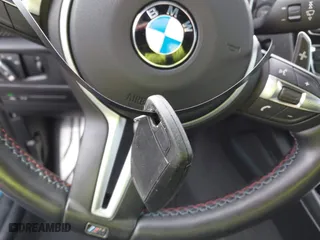 2017 BMW M2 with VIN WBS1H9C57HV886785, listed as a IAAI auction lot 41716752 with 63,388 mi miles. Bid and sale history available at carsss.com. Image 11.