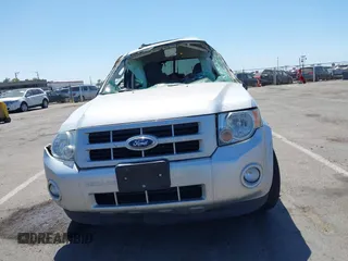 2011 Ford Escape Hybrid with VIN 1FMCU4K33BKB53300, listed as a IAAI auction lot 42561682 with 144,628 mi miles and . Bid and sale history available at DreamBid. Image 12.