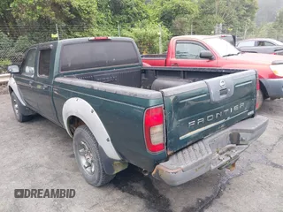 2002 Nissan Frontier XE with VIN 1N6ED29X02C368487, listed as a IAAI auction lot 42724731 with 163,342 mi miles and . Bid and sale history available at DreamBid. Image 3.