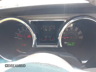 2009 Ford Mustang with VIN 1ZVHT84NX95133912, listed as a IAAI auction lot 42046053 with 57,438 mi miles and . Bid and sale history available at DreamBid. Image 7.