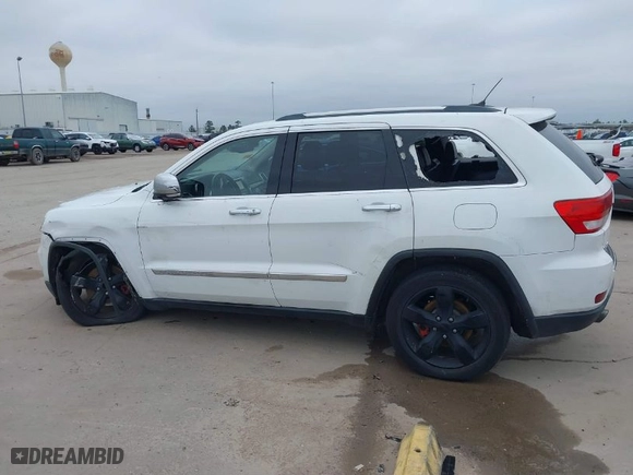 2013 Jeep Grand Cherokee Limited with VIN 1C4RJFBT3DC545662, listed as a IAAI auction lot 41576431 with 153,142 mi miles. Bid and sale history available at carsss.com. Image 14.