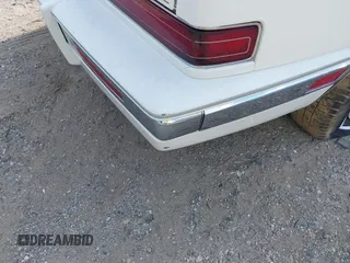 1991 Cadillac Seville z VIN 1G6KS53B9MU820155, wystawiony jako IAAI lot #40035441 z przebiegiem 78 021 mil mil oraz . Historia ofert i sprzedaży dostępna na DreamBid. Obrazek 13.