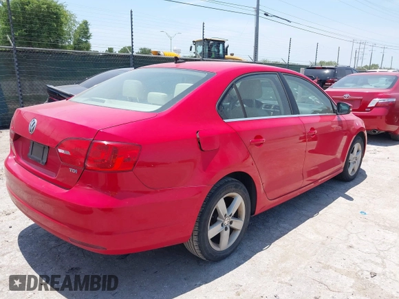 2013 Volkswagen Jetta TDI w/Premium with VIN 3VW3L7AJ6DM287865, listed as a IAAI auction lot 42480102 with 181,677 mi miles and . Bid and sale history available at DreamBid. Image 4.