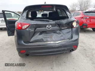 2015 Mazda CX-5 Touring with VIN JM3KE4CY1F0439016, listed as a IAAI auction lot 42039259 with 201,325 mi miles and . Bid and sale history available at carsss.com. Image 6.