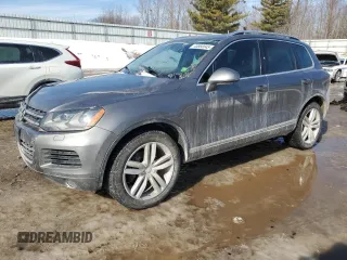 2012 Volkswagen Touareg Lux z VIN WVGEK9BP9CD006371, wystawiony jako Copart lot #45868045 z przebiegiem 144 210 mil mil oraz Czysty tytuł • Clean title. Historia ofert i sprzedaży dostępna na DreamBid. Obrazek 1.