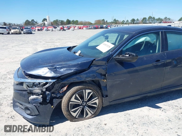 2016 Honda Civic EX-L with VIN 19XFC1F72GE044319, listed as a IAAI auction lot 41823220 with 129,868 mi miles and . Bid and sale history available at DreamBid. Image 6.
