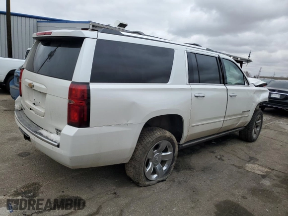2017 Chevrolet Suburban Premier with VIN 1GNSKJKC6HR305372, listed as a Copart auction lot 47477705 with 141,324 mi miles and Salvage Title. Bid and sale history available at DreamBid. Image 3.
