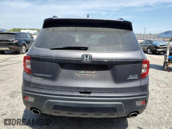 2021 Honda Passport Elite with VIN 5FNYF8H08MB014398, listed as a Copart auction lot 50499375 with 52,550 mi miles and Salvage Title. Bid and sale history available at DreamBid. Image 6.