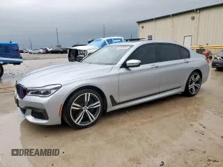 2019 BMW 7 Series 750i z VIN WBA7F0C51KGM25321, wystawiony jako Copart lot #50520635 z przebiegiem 76 501 mil mil oraz Czysty tytuł • Clean title. Historia ofert i sprzedaży dostępna na DreamBid. Obrazek 1.
