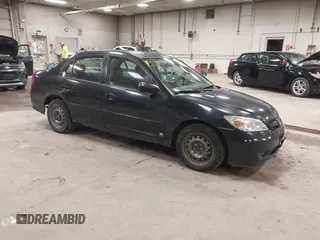 2004 Honda Civic LX with VIN 2HGES165X4H517818, listed as a IAAI auction lot 42164416 with 164,918 mi miles and . Bid and sale history available at carsss.com. Image 1.