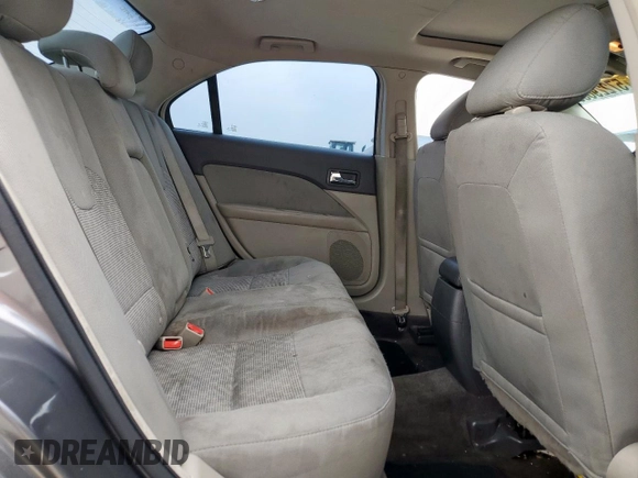 2012 Ford Fusion SE z VIN 3FAHP0HA9CR226737, wystawiony jako Copart lot #57229835 z przebiegiem 204 811 mil mil oraz Szkoda całkowita • Salvage title. Historia ofert i sprzedaży dostępna na DreamBid. Obrazek 10.