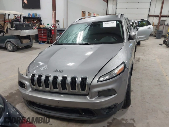 2016 Jeep Cherokee Altitude with VIN 1C4PJMCB6GW295404, listed as a IAAI auction lot 41211758 with 100,722 mi miles and . Bid and sale history available at DreamBid. Image 12.
