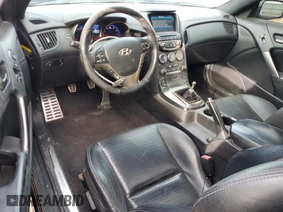 2013 Hyundai Genesis Coupe Track z VIN KMHHU6KJ4DU089727, wystawiony jako Copart lot #50002495 z przebiegiem 99 869 mil mil oraz Szkoda całkowita • Salvage title. Historia ofert i sprzedaży dostępna na DreamBid. Obrazek 8.
