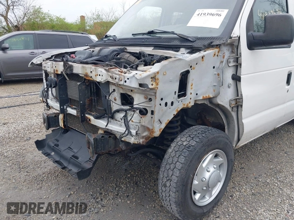 2012 Ford Econoline Cargo Commercial with VIN 1FTNE1EW0CDB10750, listed as a IAAI auction lot 41939696 with 180,042 mi miles. Bid and sale history available at carsss.com. Image 6.