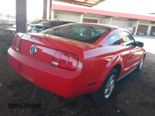 2007 Ford Mustang Deluxe z VIN 1ZVFT80NX75354713, wystawiony jako IAAI lot #41986604 z przebiegiem 156 691 mil mil oraz . Historia ofert i sprzedaży dostępna na DreamBid. Obrazek 14.