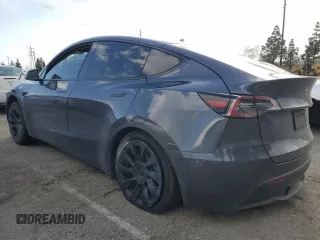 2021 Tesla Model Y Long Range with VIN 5YJYGDEE6MF200883, listed as a Copart auction lot 51707405 with 59,820 mi miles and Salvage Title. Bid and sale history available at DreamBid. Image 2.